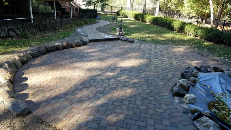 Winding paver walkway and patio